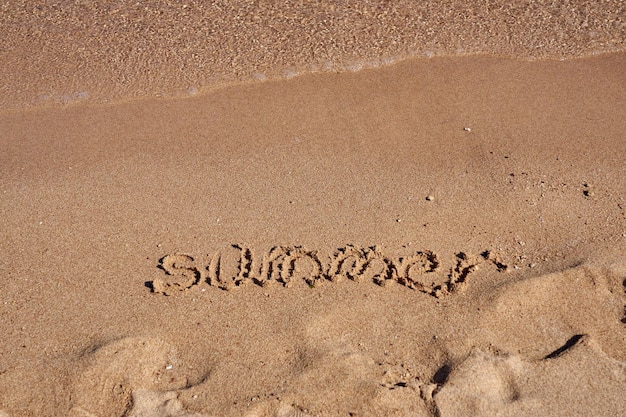 Inscription Summer on the sand on the shores of the Red Sea