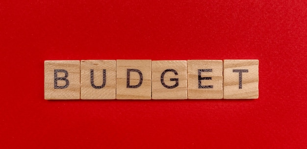 The inscription in wooden letters the word budget