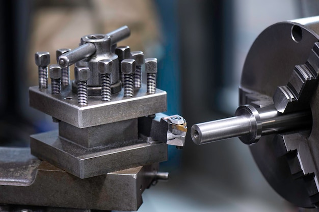 Insert in holder in the turret holding a lathe knife To lathe steel on machine in workshop