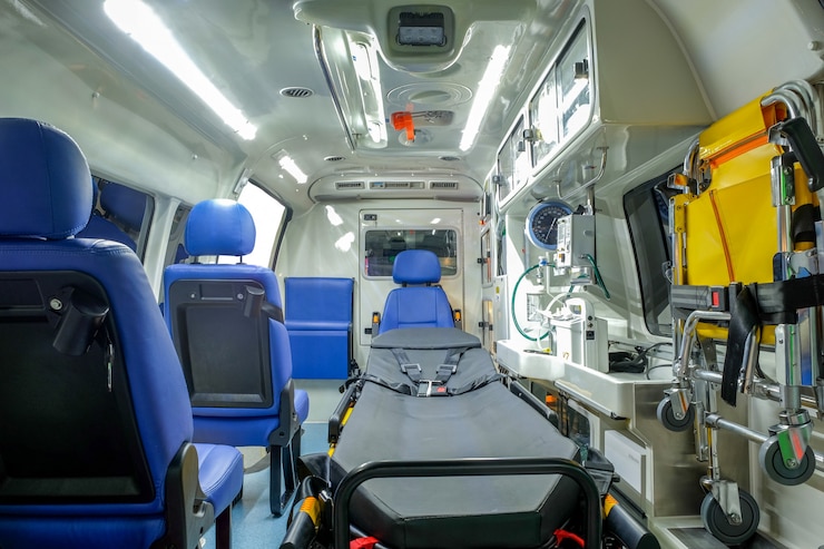 Photo inside an ambulance car with medical equipment for helping patients before delivery