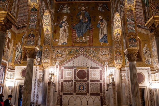 The inside of a building with gold and white decorations