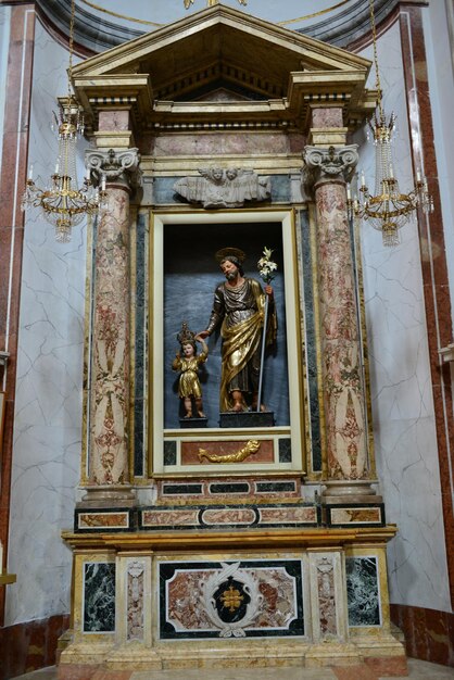 Inside the church statue of the virgin mary in italy in\
sicily