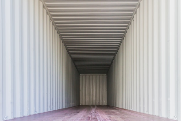 Inside an empty shipping container