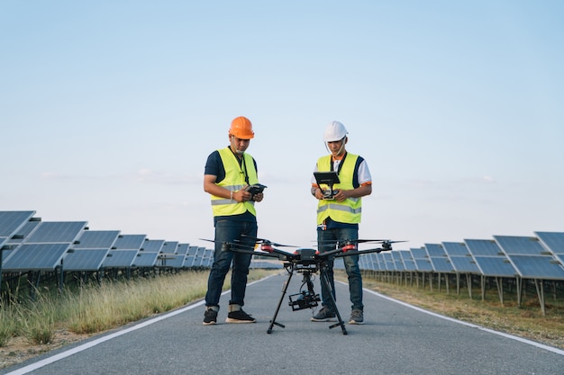 Photo inspector engineering concept; engineer inspect solar panel  at solar power plant