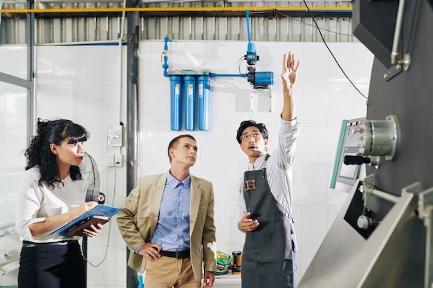 Inspectors checking coffee roastery