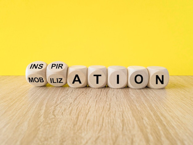 inspiration or mobilization symbol concept words inspiration and mobilization on wooden cubes