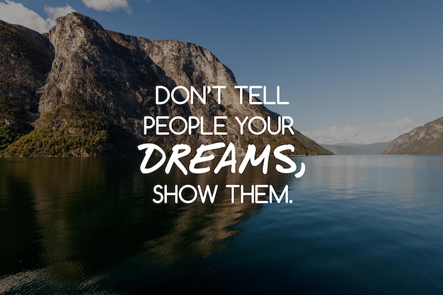 Premium Photo | Inspirational and motivational quotes don't tell them your  dreams show them blurry background