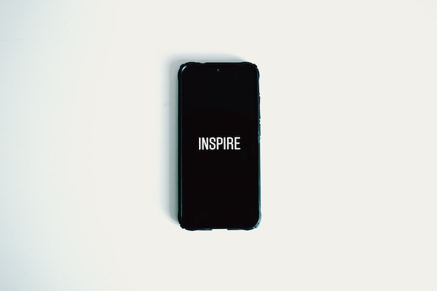 Inspire sign on the phone top view