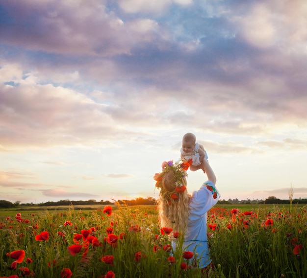 Photo inspired nature landscape with people. mom with her baby