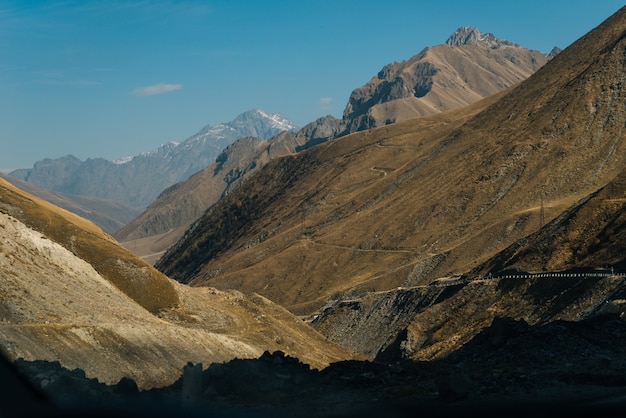 Inspiring nature, high majestic mountains under the blue sky