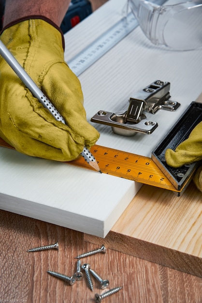 Installation of furniture hinges in the chipboard tools and accessories