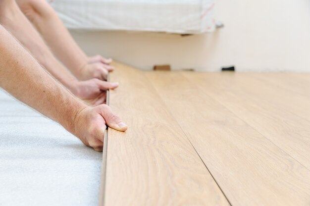 Installation of a laminate floorboard.