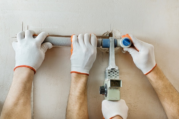 Installation of water pipes in the wall for the built-in shower