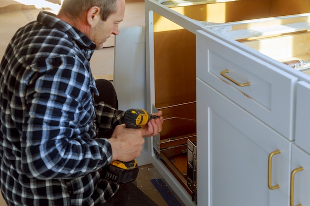 Photo installed drawers garbage bin with front for drawer inside for small objects