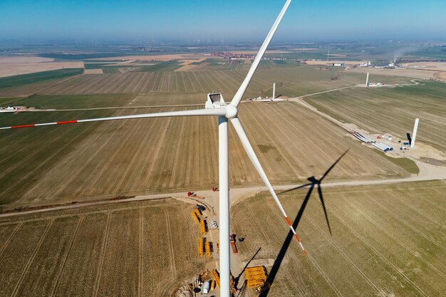 Installing new wind generator windmill turbine maintenance construction site with cranes