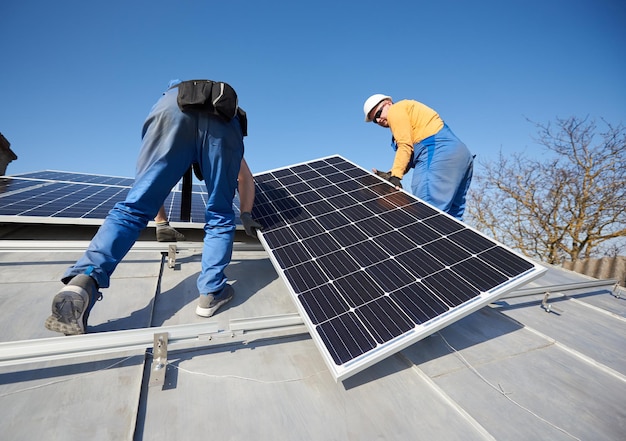 Installing solar photovoltaic panel system on roof of house