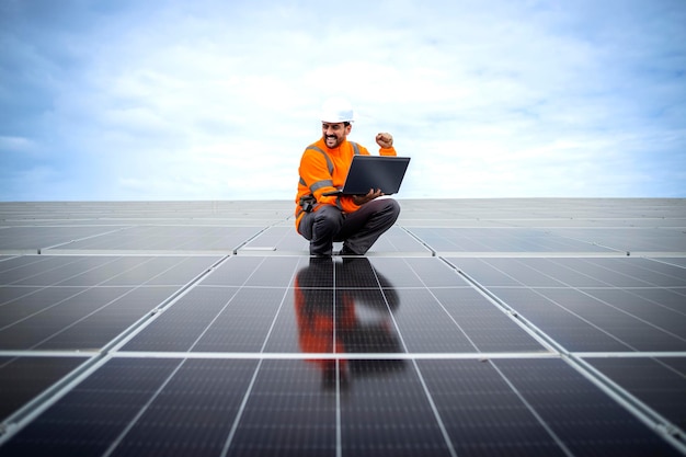 Installing solar power plant as sustainable energy source Worker placing solar panel on the roof