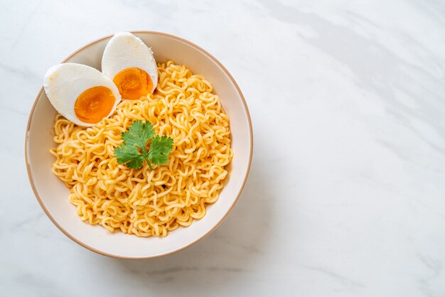 instant noodles bowl with salt egg