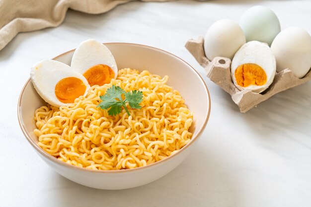 instant noodles bowl with salt egg