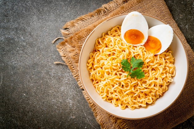 instant noodles bowl with salt egg