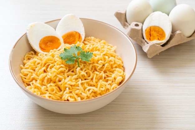 Instant noodles bowl with salt egg