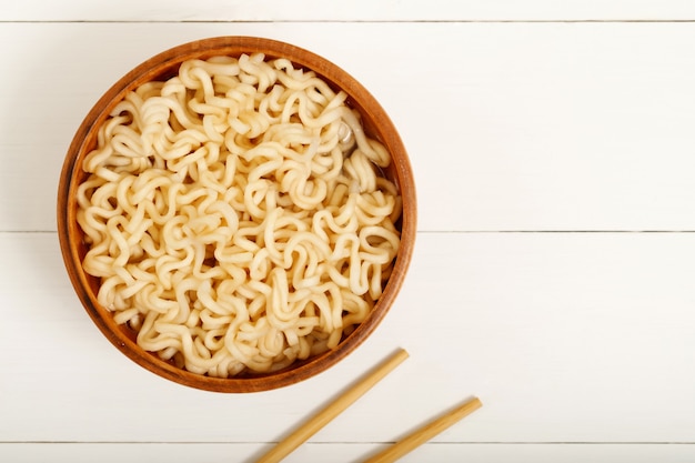 Instant noodles in wood bowl