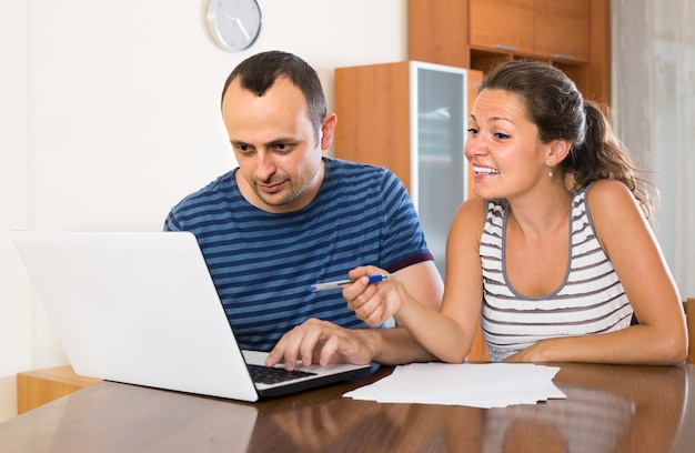 Insurance agent helping client to choose the product