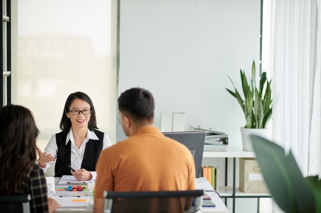 Insurance Agent Talking to Couple