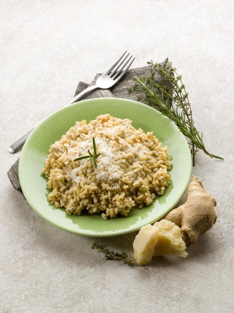 Integral risotto with ginger rosemary parmesan and gorgonzola cheese