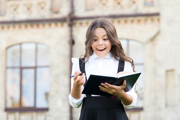 Intellectual task Cognitive process Start new school project Towards knowledge Students life School student Intelligent child Welcome back to school School girl formal uniform hold book