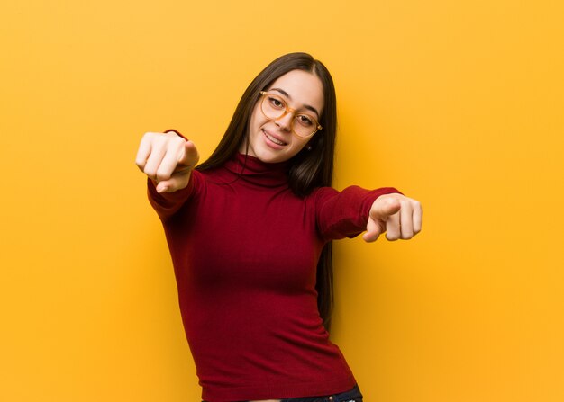 Intellectual young girl cheerful and smiling