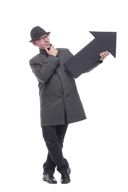 intelligent man in a hat pointing in the direction. isolated on a white background.