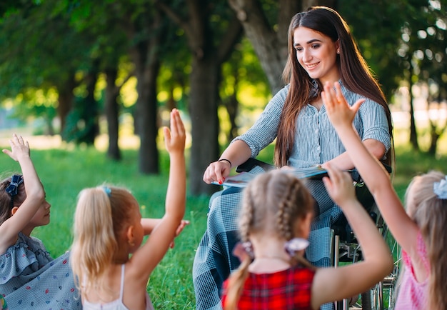 Interaction of a teacher in a wheelchair with students