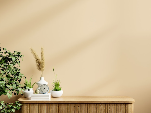 Interieur crèmekleurige muur mockup met groene plant.3D-rendering