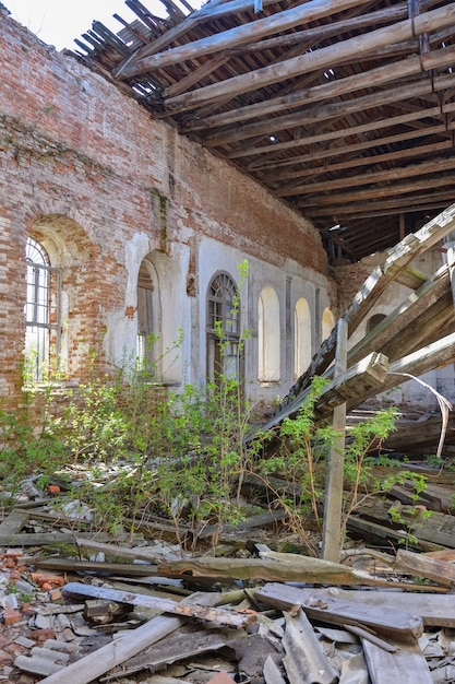 The interior of abandoned and ruined building disheveled church in russia