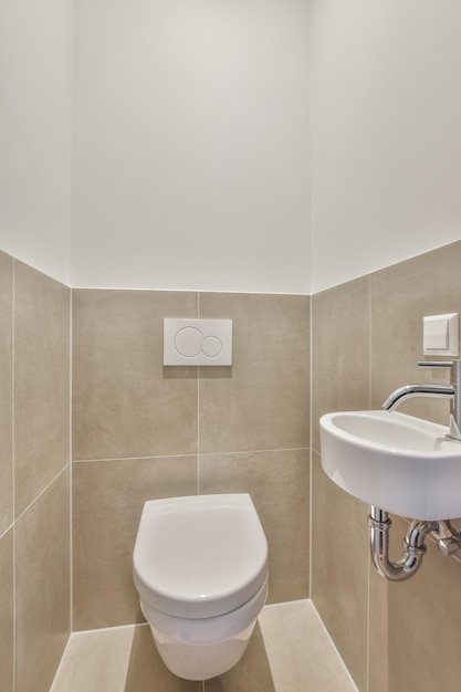 The interior of the bathroom is covered with beige tiles