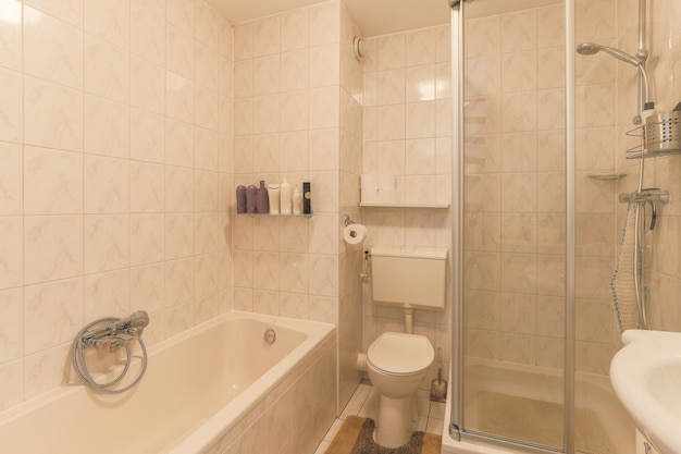 Interior of bathroom with white bathtub