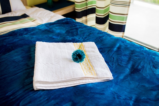 Photo interior of the bedroom in white and green colors