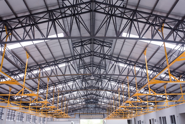 interior of a big industrial building or factory with steel constructions