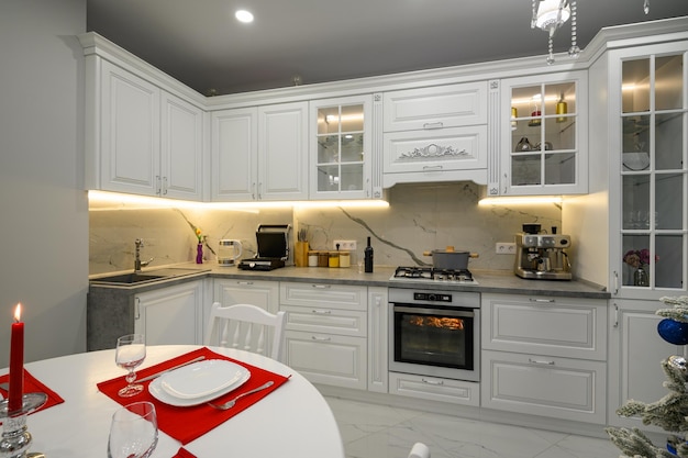 Interior of bright modern kitchen decorated for christmas