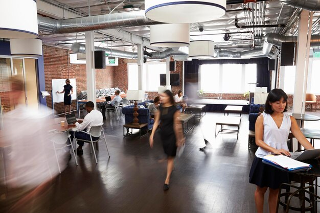 Interior Of Busy Design Office With Staff