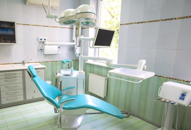 Interior of cabinet of dentist with modern equipment