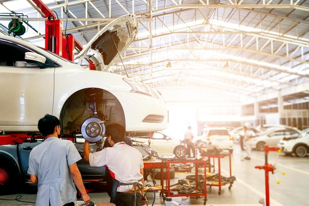 Interior of a car repair in garage service station with softfocus and over light in the background