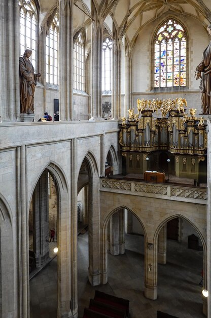 The interior of a cathedral with a large organ