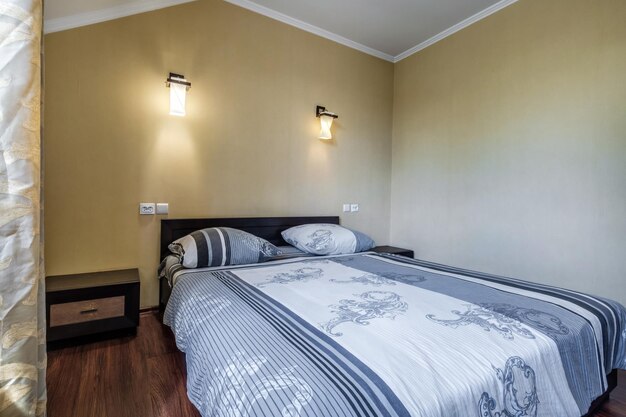 Interior of cheapest bedroom in studio apartments or hostel