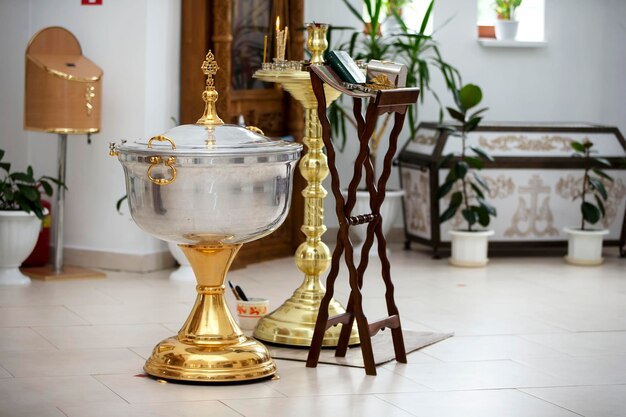 The interior of the church during the baptism of a child Bath for baptism