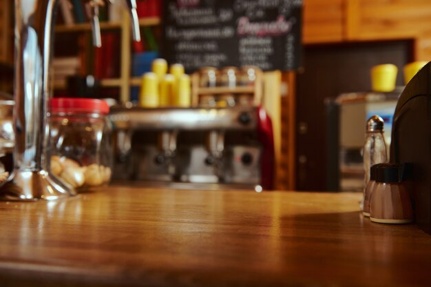 Photo interior coffee shop with professional coffee machine. cafe, cafeteria, wooden bar