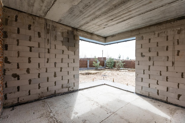 Interior construction of housing project patched without painting applied.