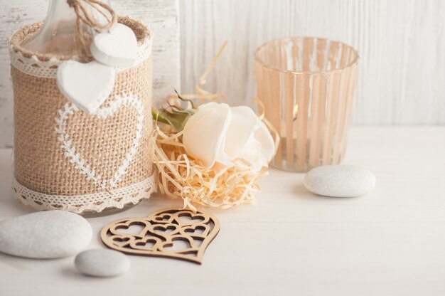 Interior decor with candle holder, rose