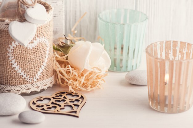 Interior decor with candle holder, rose